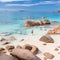 Woman enjoying Anse Lazio picture perfect beach on Praslin Island, Seychelles.