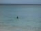 A woman enjoying a beach in the caribbean