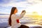 Woman enjoying beautiful cloudscape