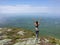 Woman enjoying the beautiful view of hills and mountains whilst hiking in Maine USA