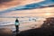 Woman enjoying Diamond beach view in Iceland