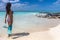 Woman enjoying with her sexy bikini on isla mujeres and snorkeling gear on a paradisiacal beach of turquoise colors.