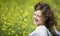 Woman enjoying in rapeseed field