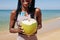 Woman enjoying refreshing coconut cocktail