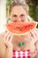 Woman Enjoying Slice Of Water Melon