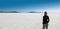 Woman enjoying the stark beauty of the Bonnevile Salt Flats