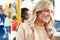 Woman Enjoying Takeaway Drink On Bus Journey