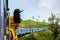 Woman enjoying train ride through Sri Lanka tea plantations