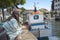 Woman enjoying the view in the harbor of a ocean village sea port