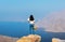 Woman enjoying view over Fjord Khor Najd in Oman