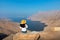 Woman enjoying view over Fjord Khor Najd in Oman