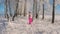 Woman Enjoying Winter Snow In Outdoor, She Whirling Around Under The Snowfall