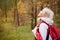 Woman enjoys hiking in wood