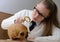 Woman examining a human skull