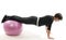 woman exercise push ups core training ball