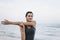 Woman exercising at the beach