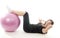 Woman exercising core training fitness ball