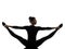 Woman exercising gymnastic yoga stretching split silhouette