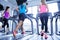 Woman exercising on treadmill in gym