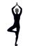 Woman exercising Vrksasana tree pose yoga silhouette