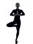 Woman exercising Vrksasana tree pose yoga silhouette