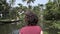 Woman exploring kerala backwaters by canoe