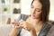 Woman extracting a pill from the blister