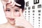 Woman and eye test chart