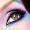 Woman eyes with beautiful fashion bright blue makeup