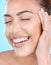 Woman, face and beauty skincare, happy smile with healthy teeth, dental wellness and natural makeup in blue studio