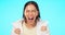 Woman, face and excited shout on blue background for surprise, announcement or celebration of success, winning or