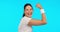 Woman, face and exercise for flexing, strong arms and muscle for smile, excited and pride by blue background. Girl