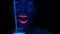 Woman face with fluorescent make up