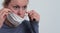 Woman with face mask protecting herself from coronavirus  stock photo