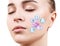 Woman face with vitamins icons. Healthy skin concept.