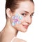 Woman face with vitamins icons. Healthy skin concept.