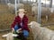 Woman farm worker taking care of sheep