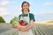 Woman farmer apron standing farmland smiling Female agronomist specialist farming agribusiness Happy positive caucasian worker