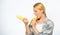Woman farmer choose yellow corn cob on white background. Girl rustic style hold ripe corn. Nutrition value information