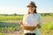 Woman farmer holding basket of fresh eggs, nature, garden, countryside background