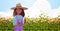 Woman farmer holding corn cob african american countrywoman in overalls standing on corn field organic agriculture