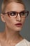 Woman In Fashion Glasses. Beautiful Female In Stylish Eyeglasses