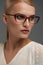 Woman In Fashion Glasses. Beautiful Female In Stylish Eyeglasses