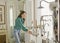 Woman in faucets and plumbing store