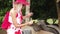 Woman feeding giant tortoise