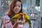 Woman feeding parrots on her hand