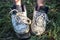 Woman feet at home with broken slippers.