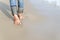 Woman feet relax walk on beach