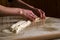 Woman, female hands preparing Balkan traditional food