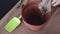 Woman is filling Ceramic flower pot with a substrate for planting indoor plants. View from above. Preparatory work.